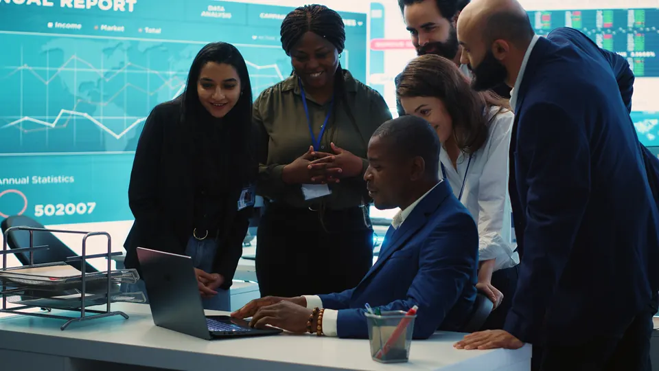 Kenyan business team reviewing successful growth results